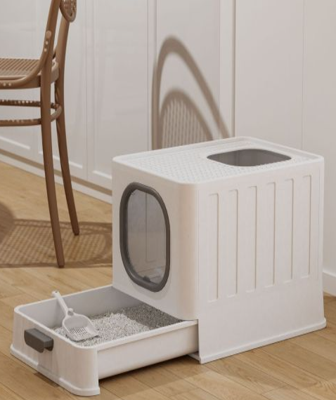 Maison de toilette pour chat blanc et gris avec le tiroir ouvert 